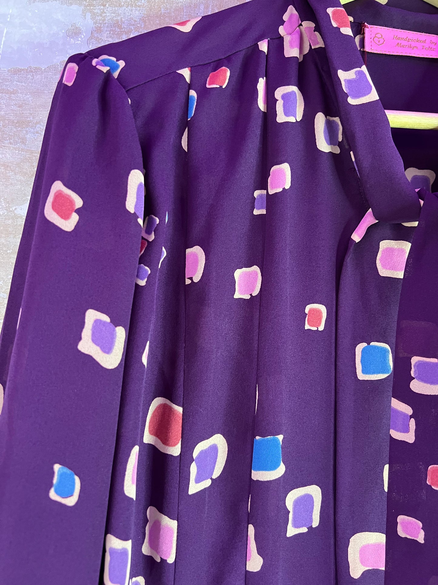 Robe vintage mauve motifs graphiques