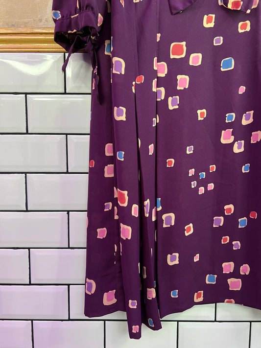 Robe vintage mauve motifs graphiques