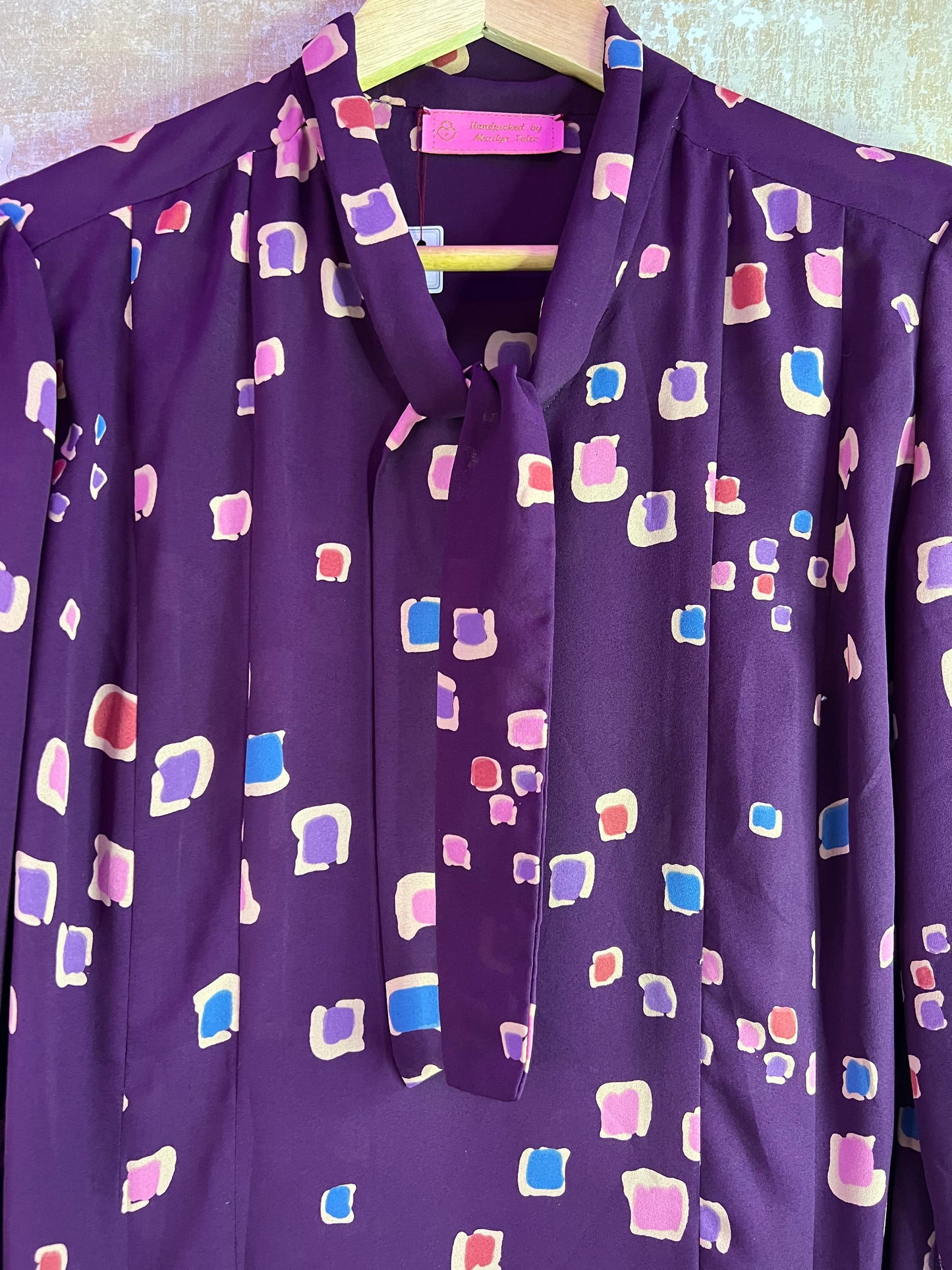 Robe vintage mauve motifs graphiques
